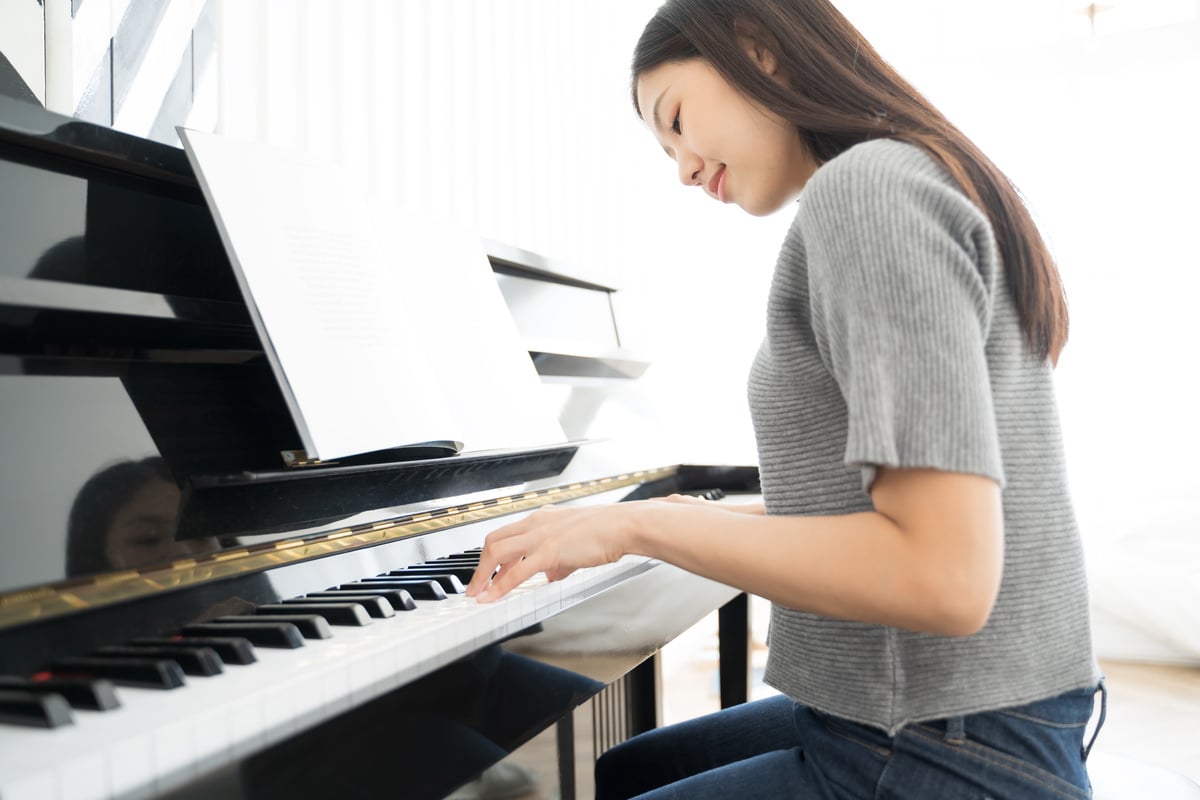 Woman Playing the Piano